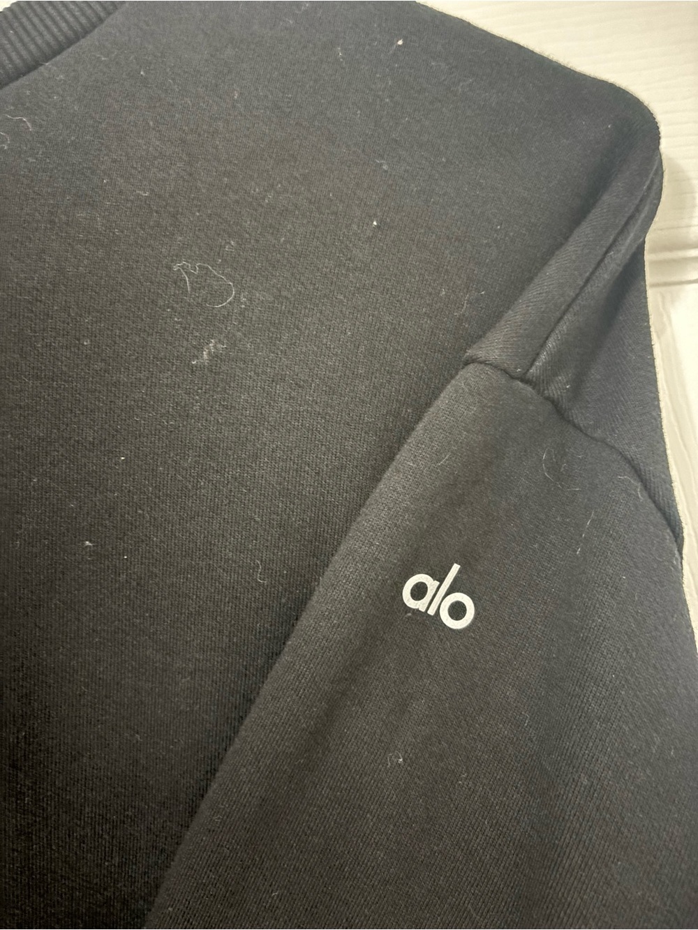 ALO Yoga Black Crewneck Sweatshirt with Subtle Logo